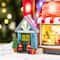 Glitzhome® 10.75" Lighted CHRISTMAS TOY MARKET Resin Village with Movement and Music